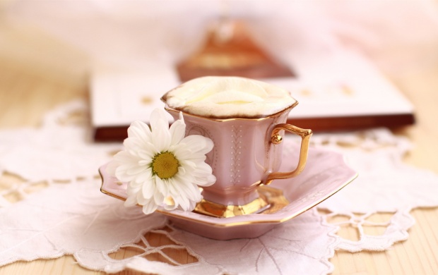 A Cup of Coffee and a Flower