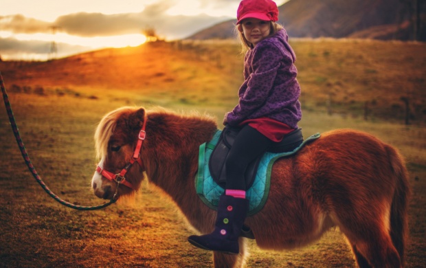 Baby Girl On Small Horse