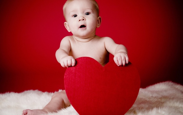 Baby Holding A Red Heart