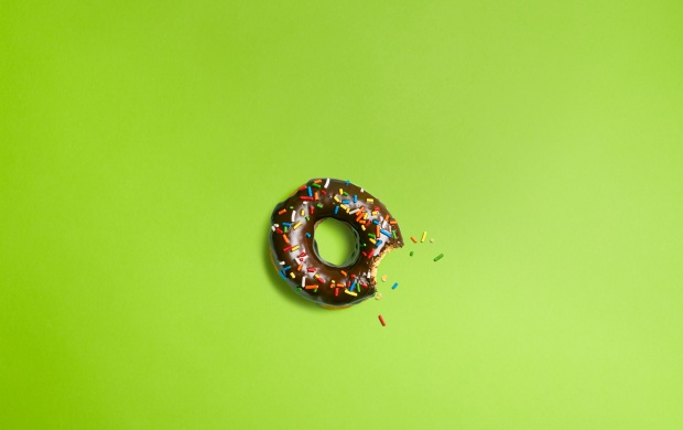 Bitten Donuts On Green Background