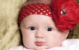 Cute Baby Wearing A Flower (click to view)