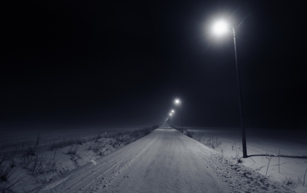 Empty Snowy Road At Night