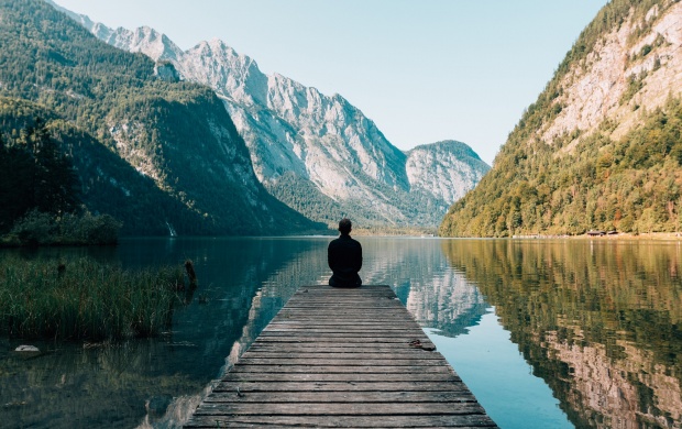 Meditating Man On Mountain Lake