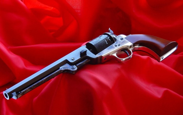 Revolver On Red Cloth