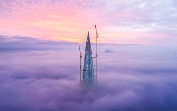 Skyscraper Above The Clouds