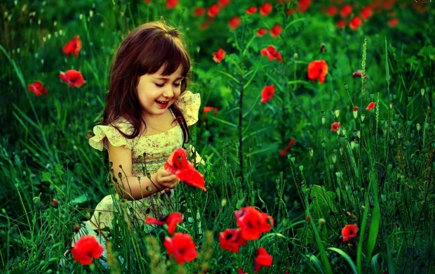 Sweet Little Girl In Garden