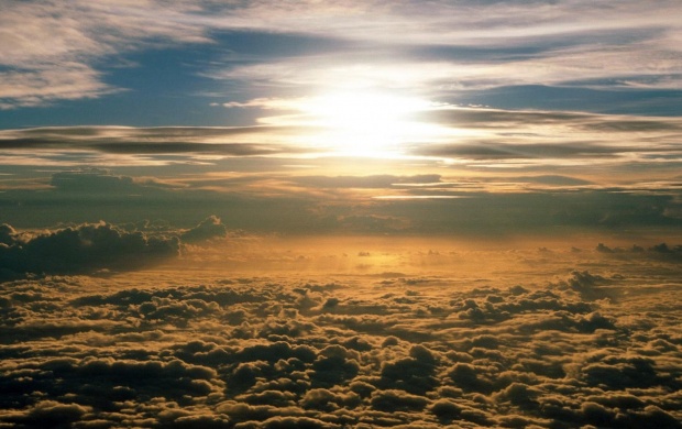 View of the Sun Above the Clouds