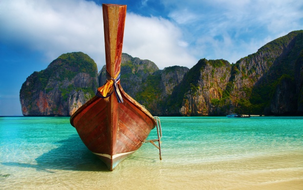 Wooden Boat on Exotic Beach