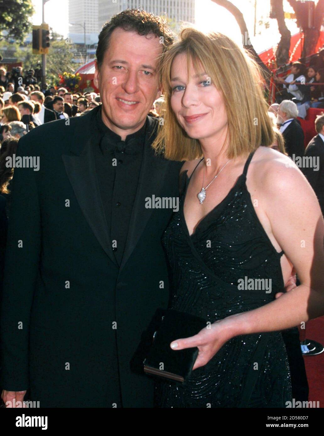 supporting Actor Nominee Geoffrey Rush And His Wife Jane Menelaus Arrive At The 71st Annual Academy Awards At The Dorothy Chandler Pavilion In Los Angeles March 21 Rush Is Nominated For His