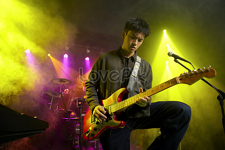 Band performance musician twists the synthesizer knob picture and hd photos free download on