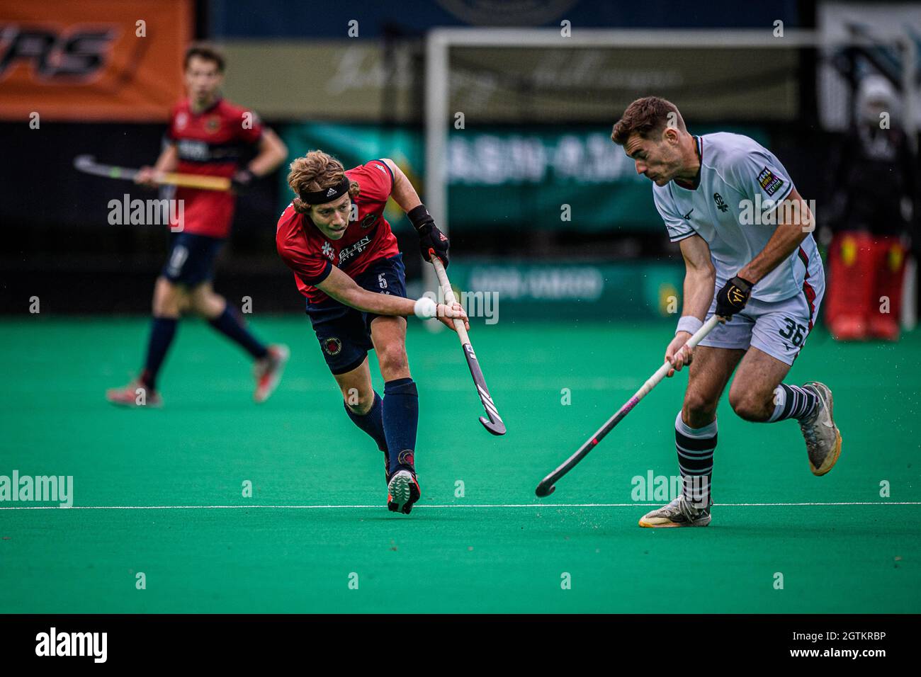 Dragons max lootens and surbitons jack middleton fight for the ball during a hockey game between belgian khc dragons and uk surbiton hc saturday stock photo