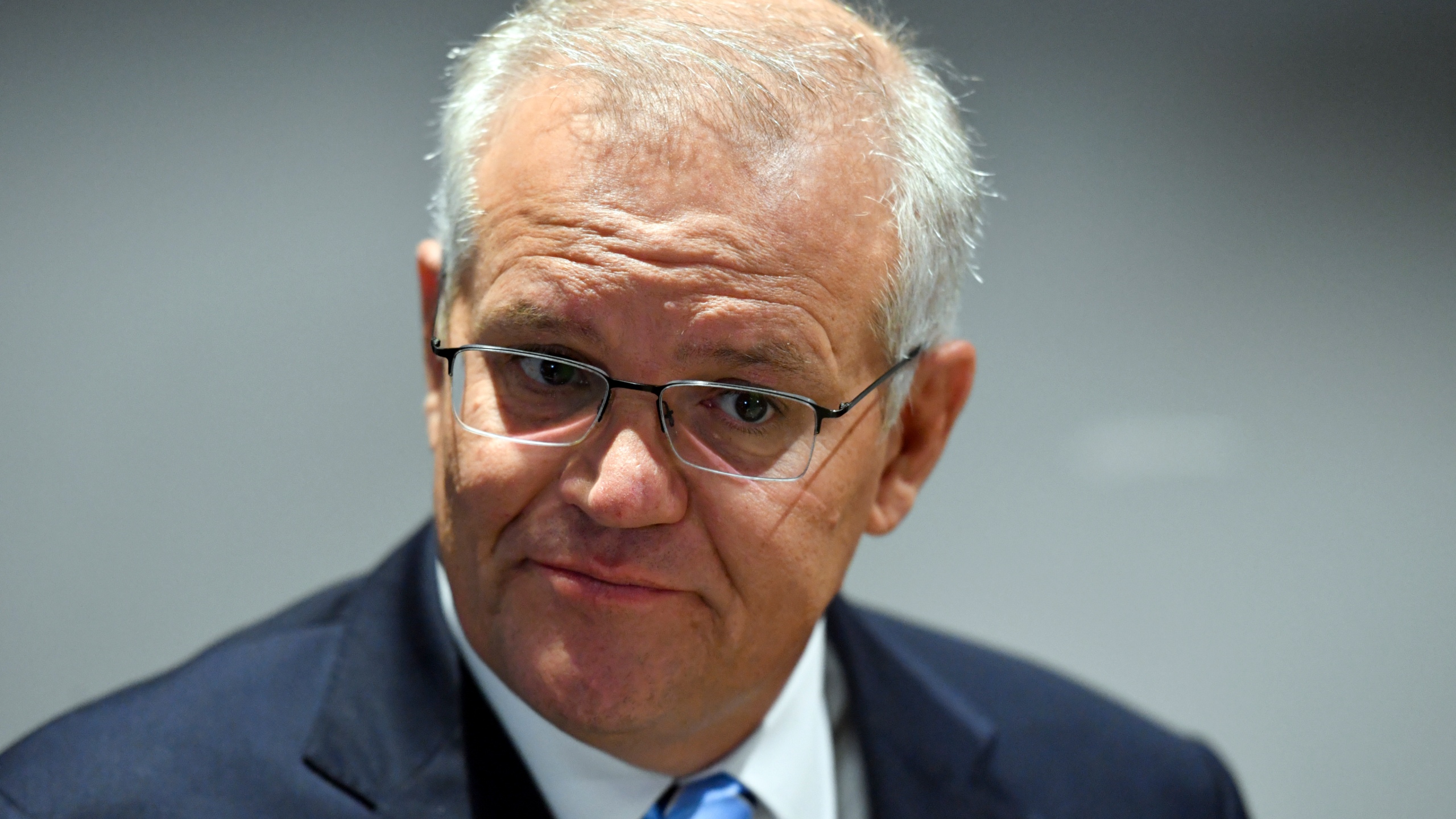 Morrison defends management of australias ties to solomons wgn radio