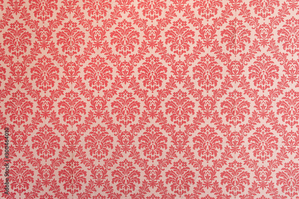 Red wallpaper vintage flock with red damask design on a white background retro vintage style