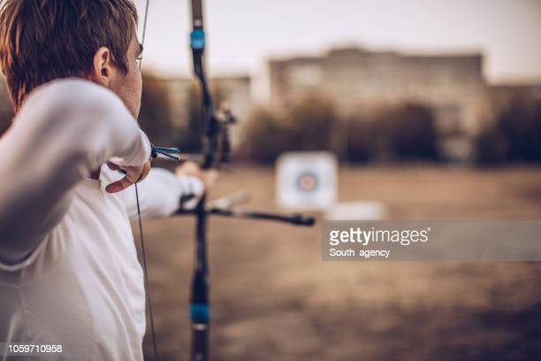 Bow and arrow photos and premium high res pictures