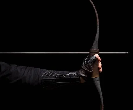 Bow and arrow stock photos and images