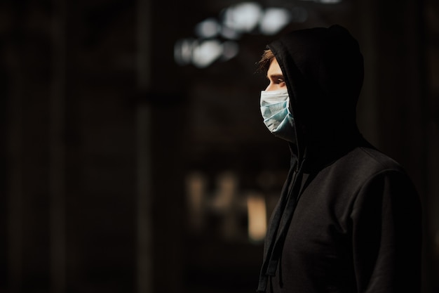 Premium photo man wearing protection face mask against coronavirus outbreak covid