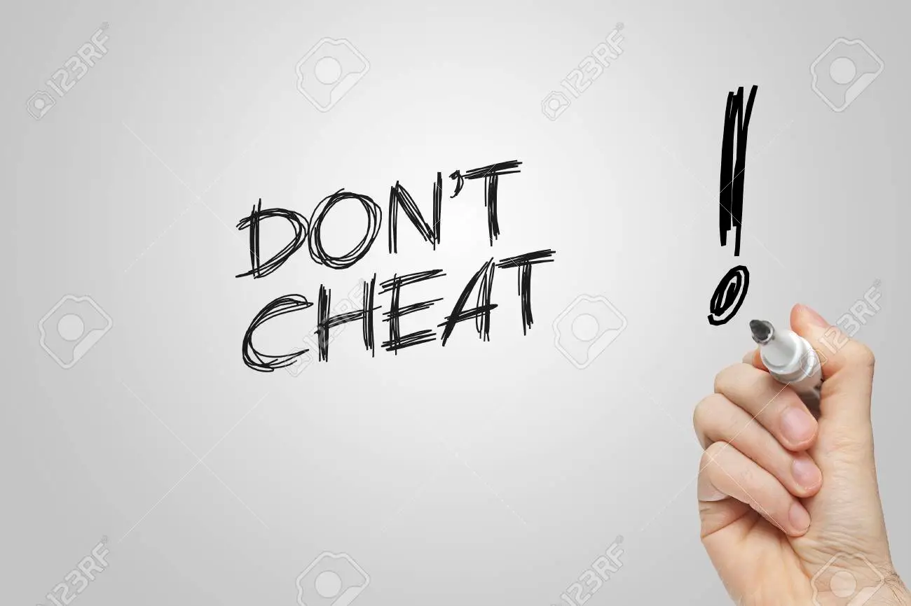 Hand writing dont cheat on grey background stock photo picture and royalty free image image