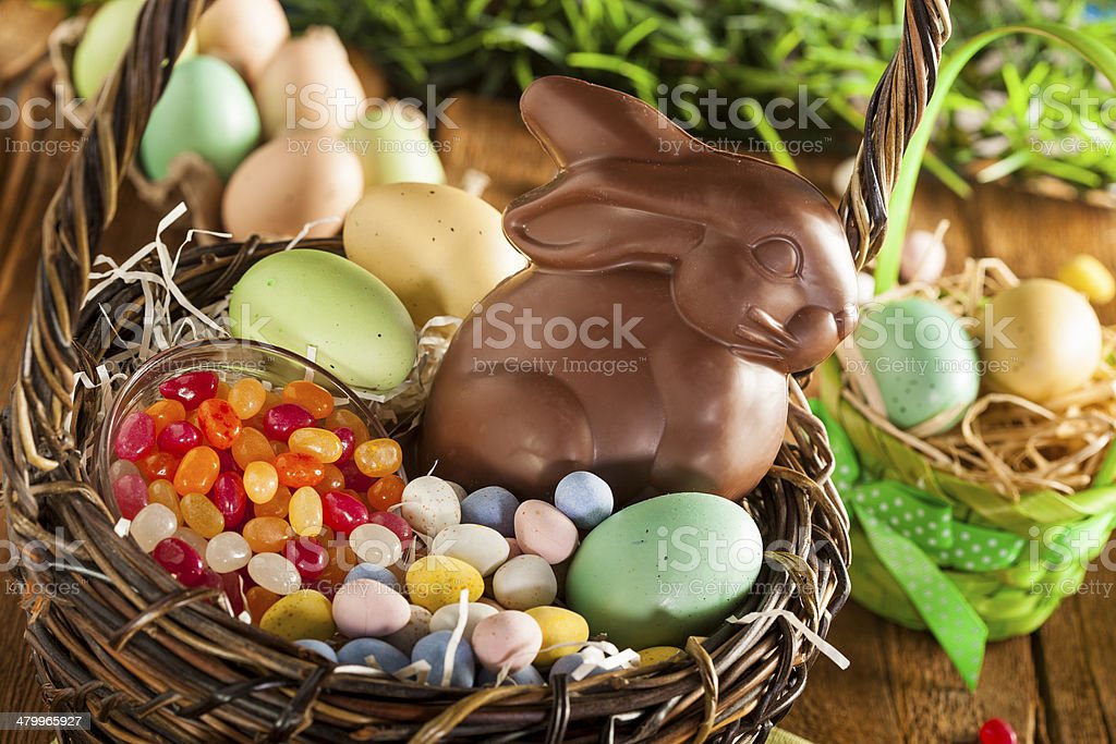 Chocolate easter bunny in a basket stock photo