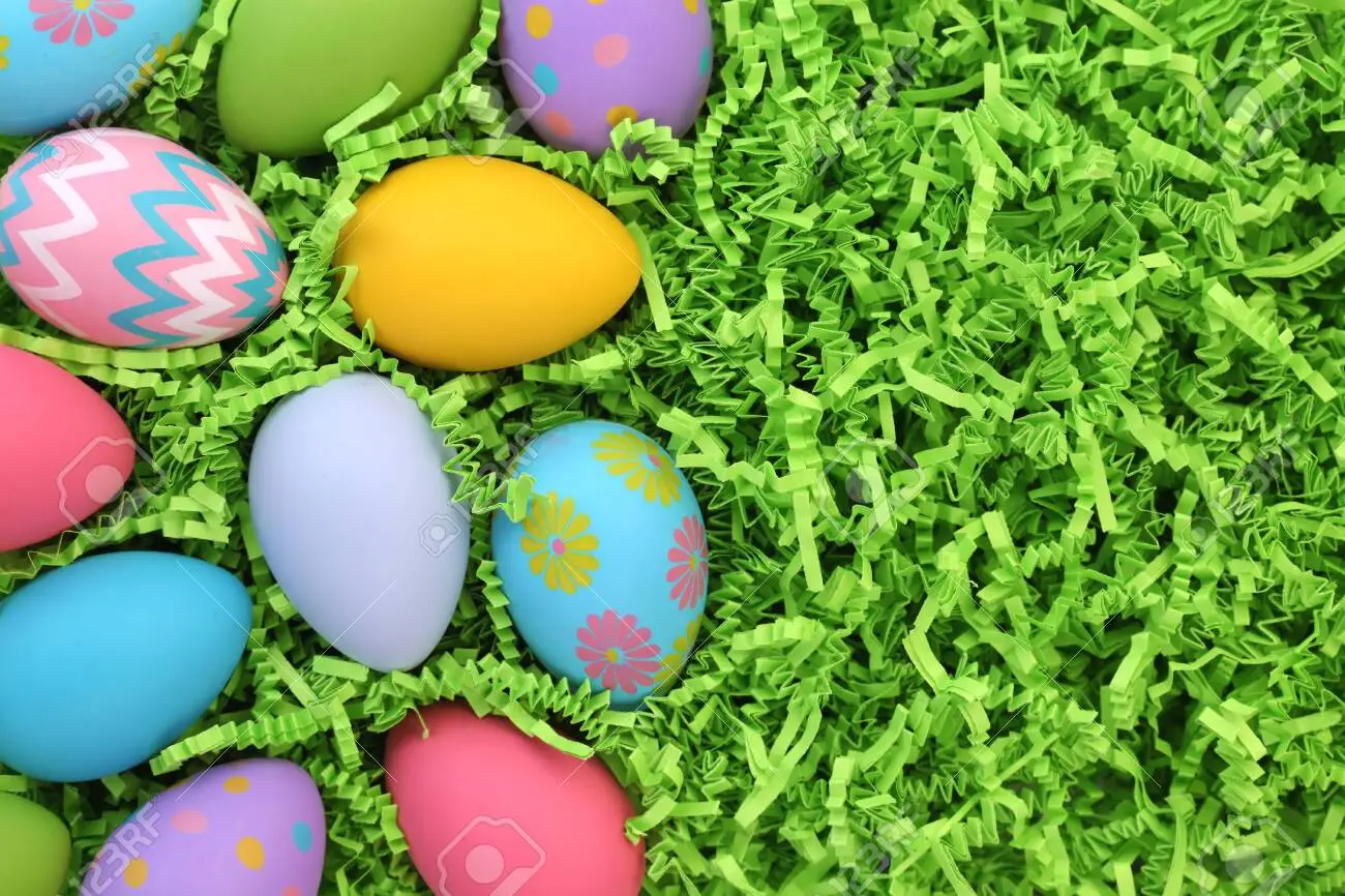 Collection of colorful easter eggs on easter grass background stock photo picture and royalty free image image