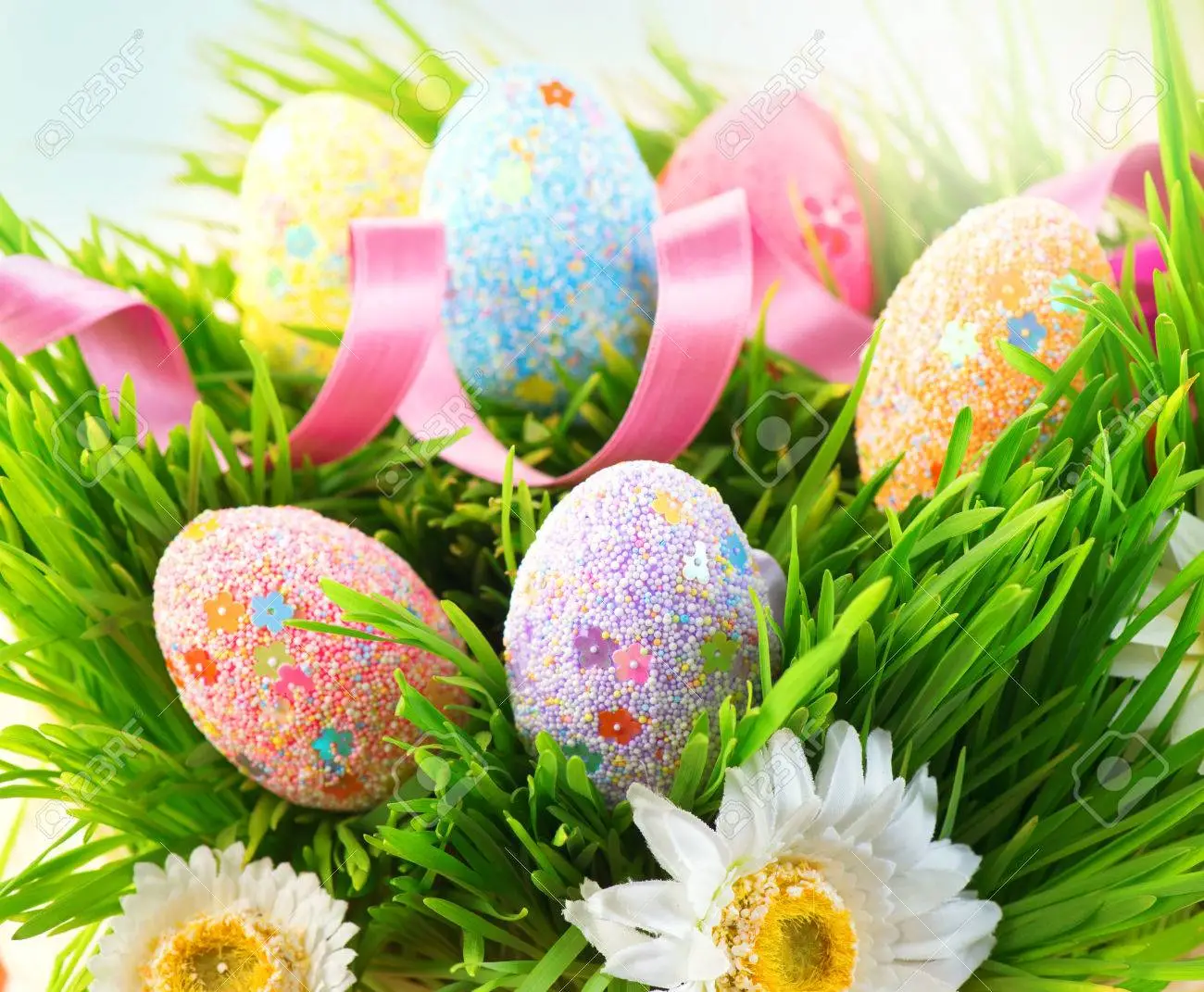 Easter scene background beautiful colorful eggs in spring grass stock photo picture and royalty free image image