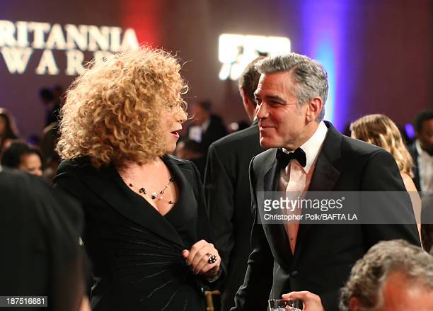 Actress alex kingston and filmmaker george clooney attend the news photo
