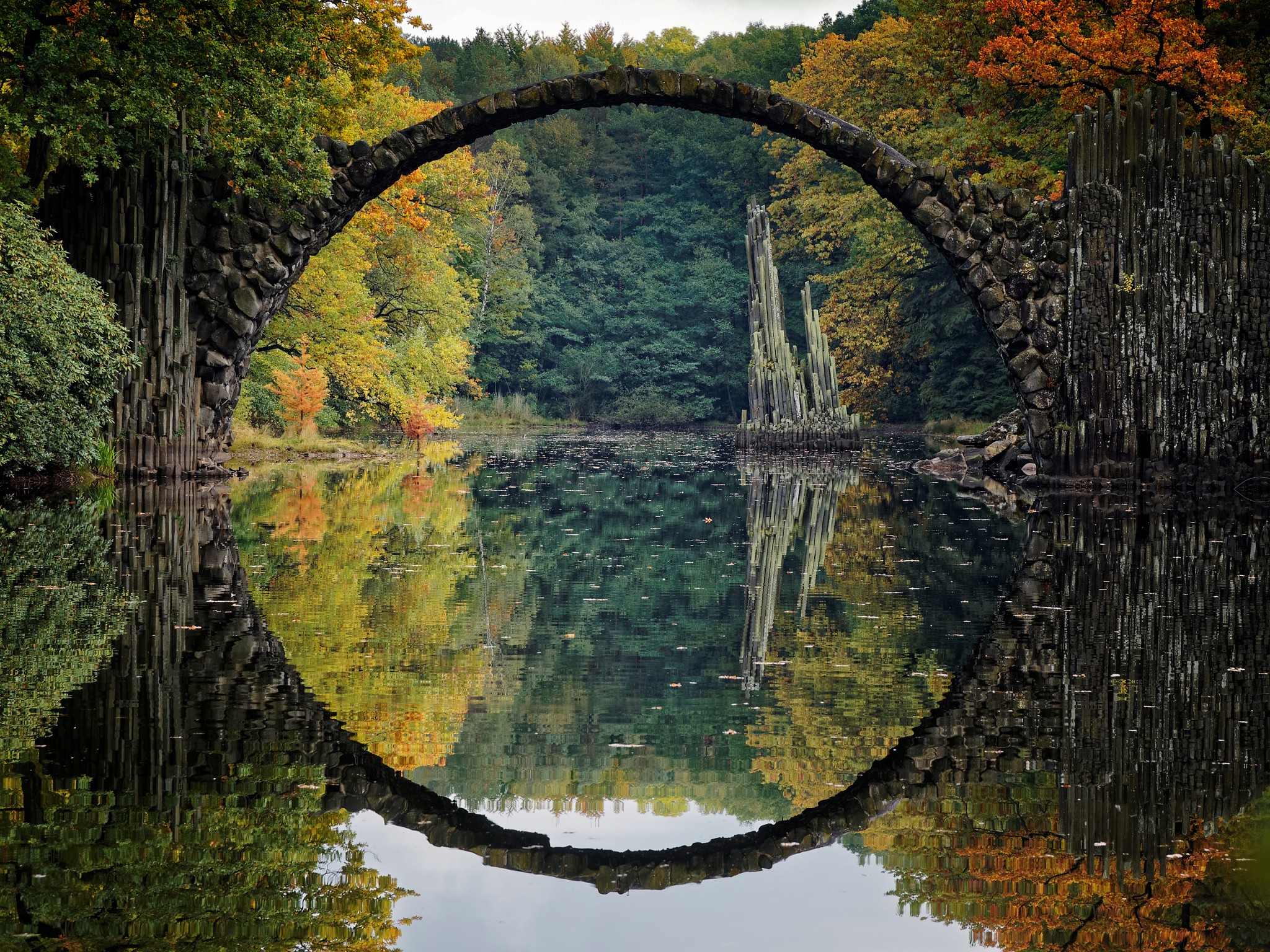 Landscape river reflection germany colorful fall bridge