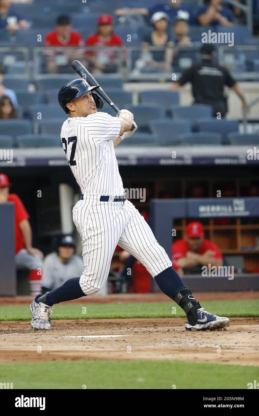 Giancarlo stanton of the new york yankees swings the bat during the game against the los angeles angels on june at yankee stadium in new york kyodokyodo photo via credit