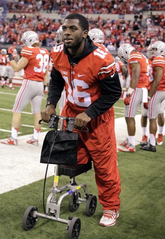 Ohio state football quarterback jt barrett embraces chance to win a championship on the field not on a scooter