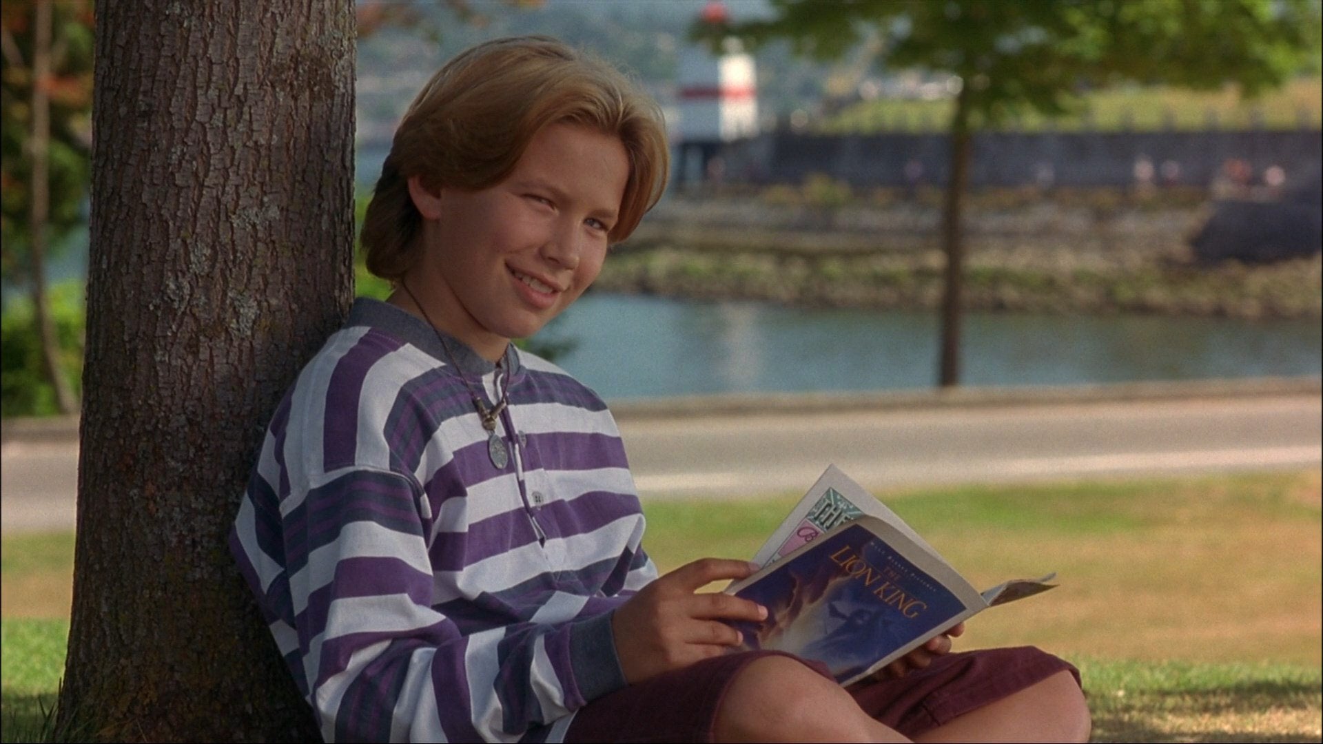 In man of the house jonathan taylor thomas is seen reading a magazine with a lion king advertisement a movie he starred in as young simba the year prior rmoviedetails