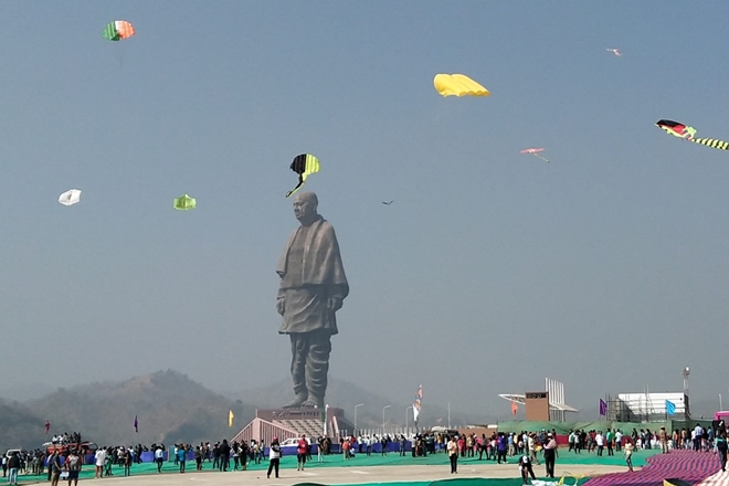 International kite festival kite fliers paint the skies over statue of unity in vibrant colours the financial express