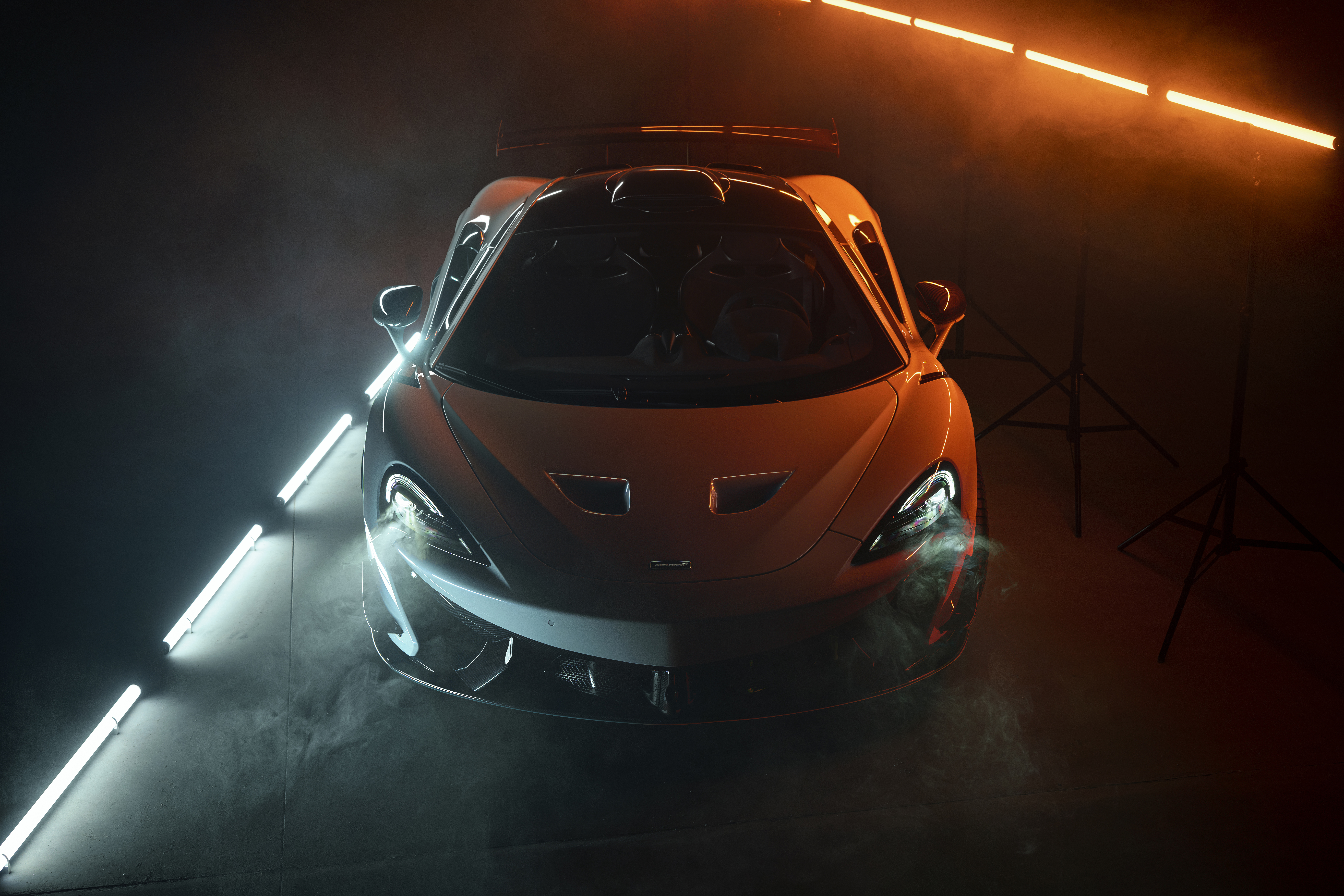 Orange mclaren r with ambient fog and lighting mclaren car orange car sport car supercar