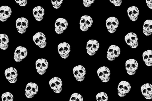 Free vector vintage skull pattern black background