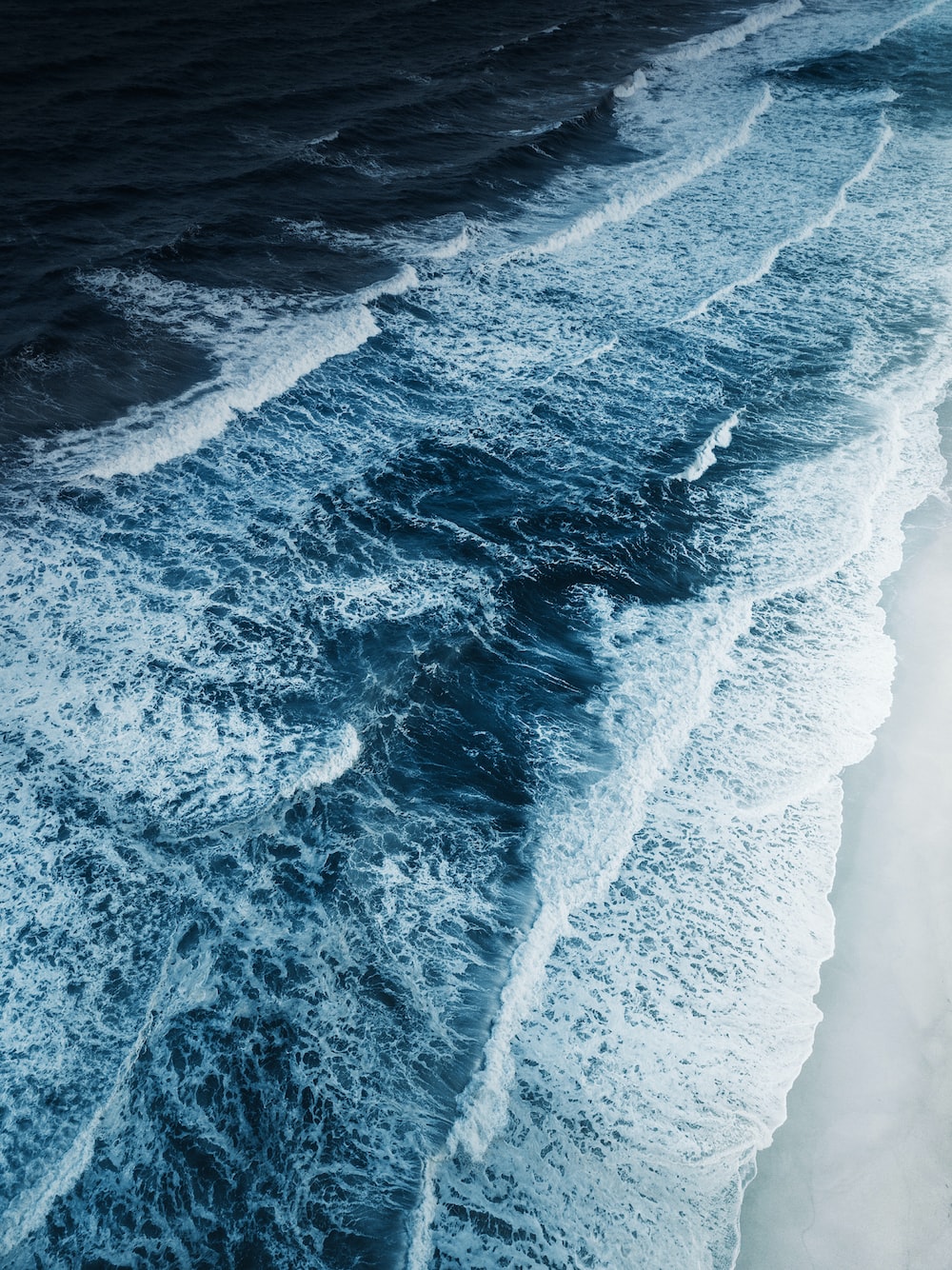 An aerial view of the ocean with waves photo â free australia image on