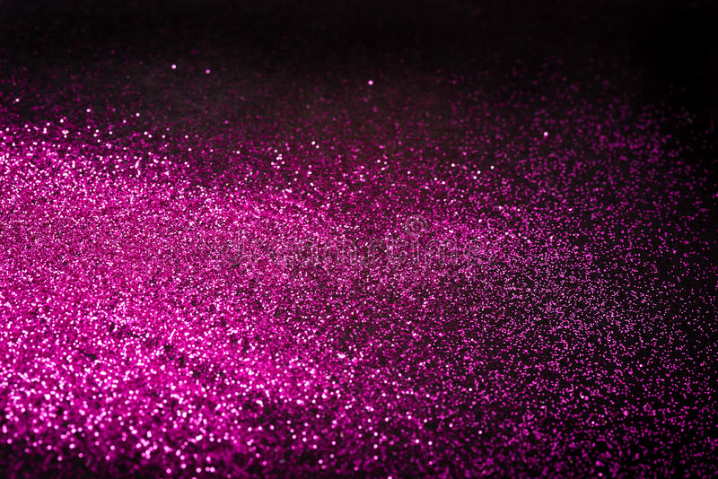 Pink glitter texture on black background Vector Image