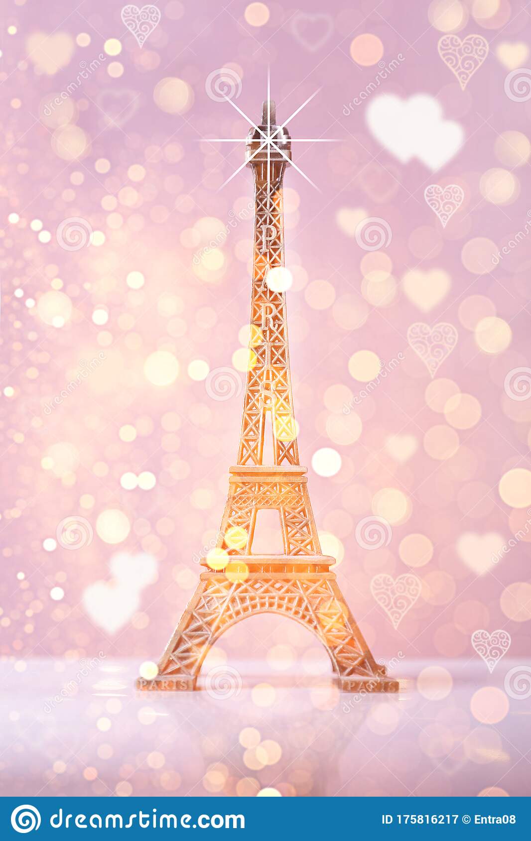 Eiffel tower souvenir with pink bokeh shine background and lightseiffel tower souvenir with pink bokeh shine background and ligh stock image