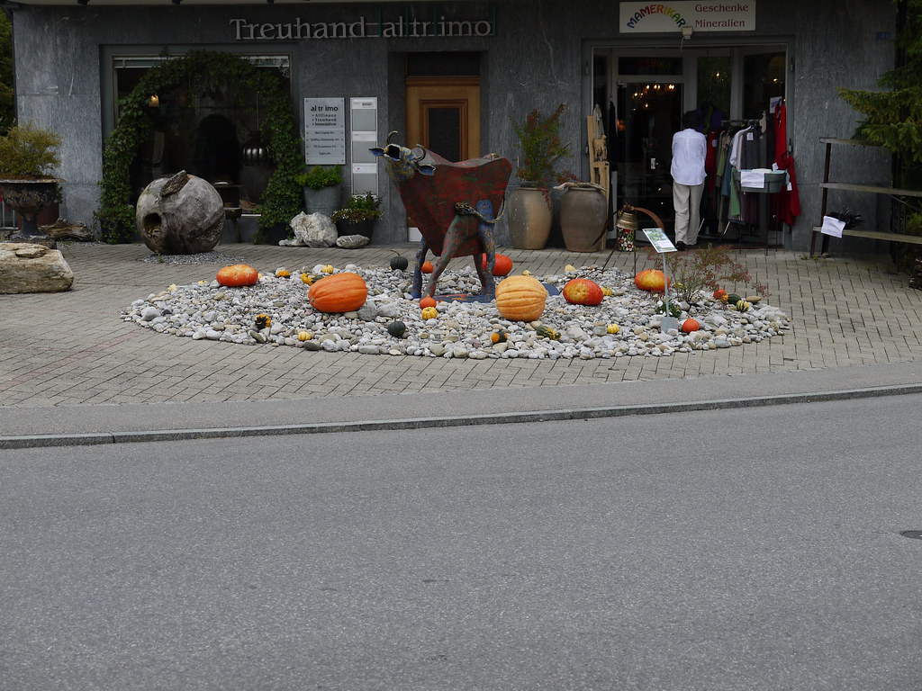 Pumpkins and cow outside a store in appenzeller switzerlaâ