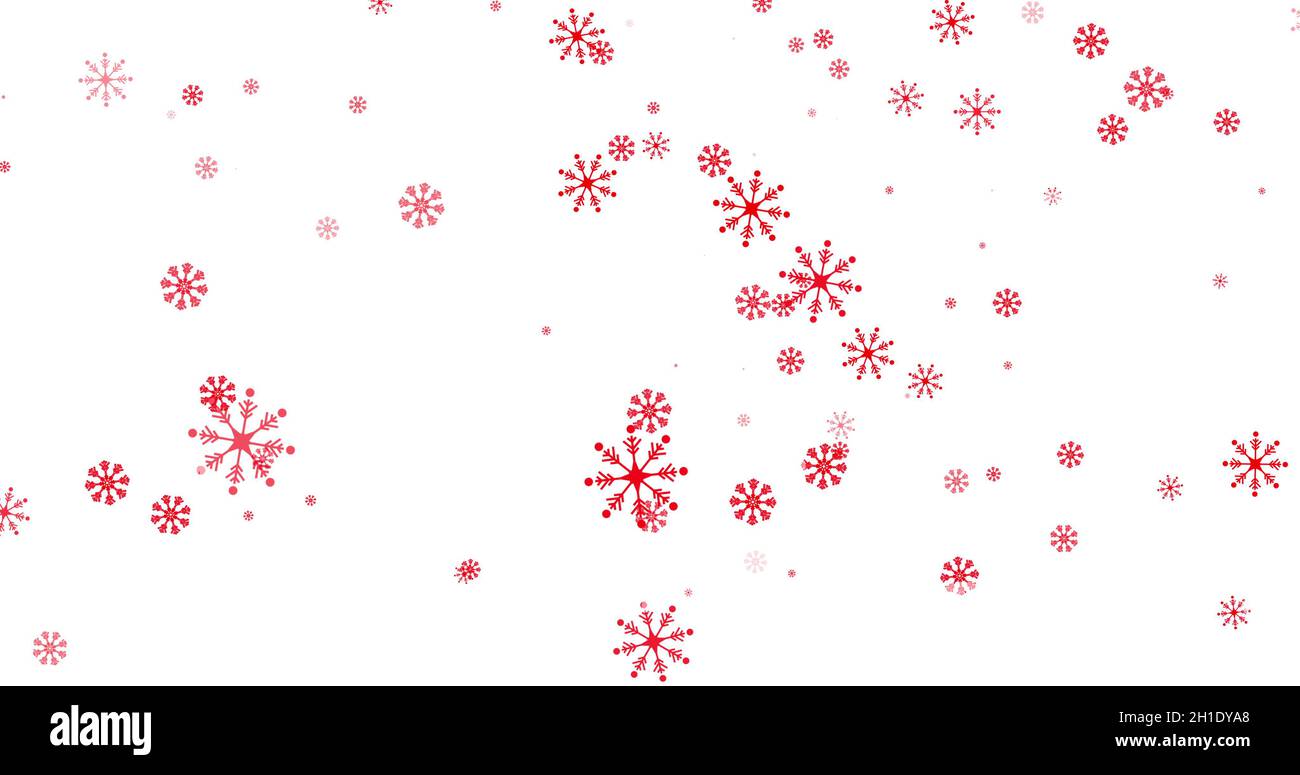 Red snowflakes falling against white background stock photo