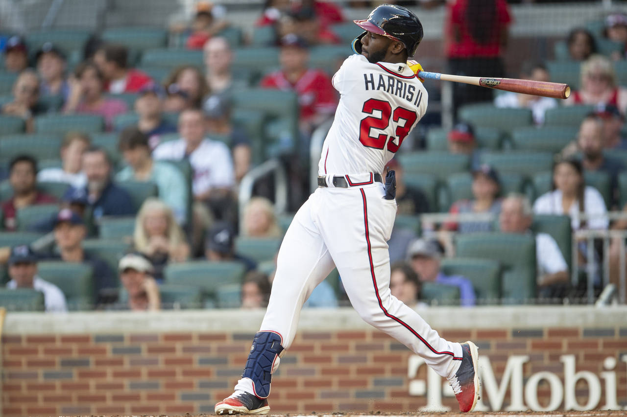Arcias tiebreaking single in th lifts braves past giants