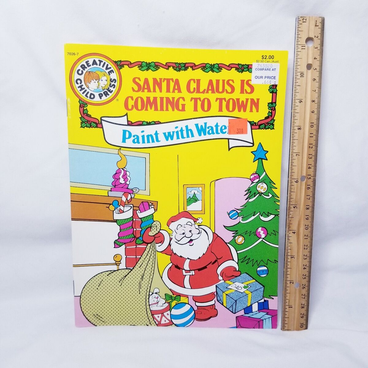 Vintage santa claus is ing to town paint with water coloring book unused nos
