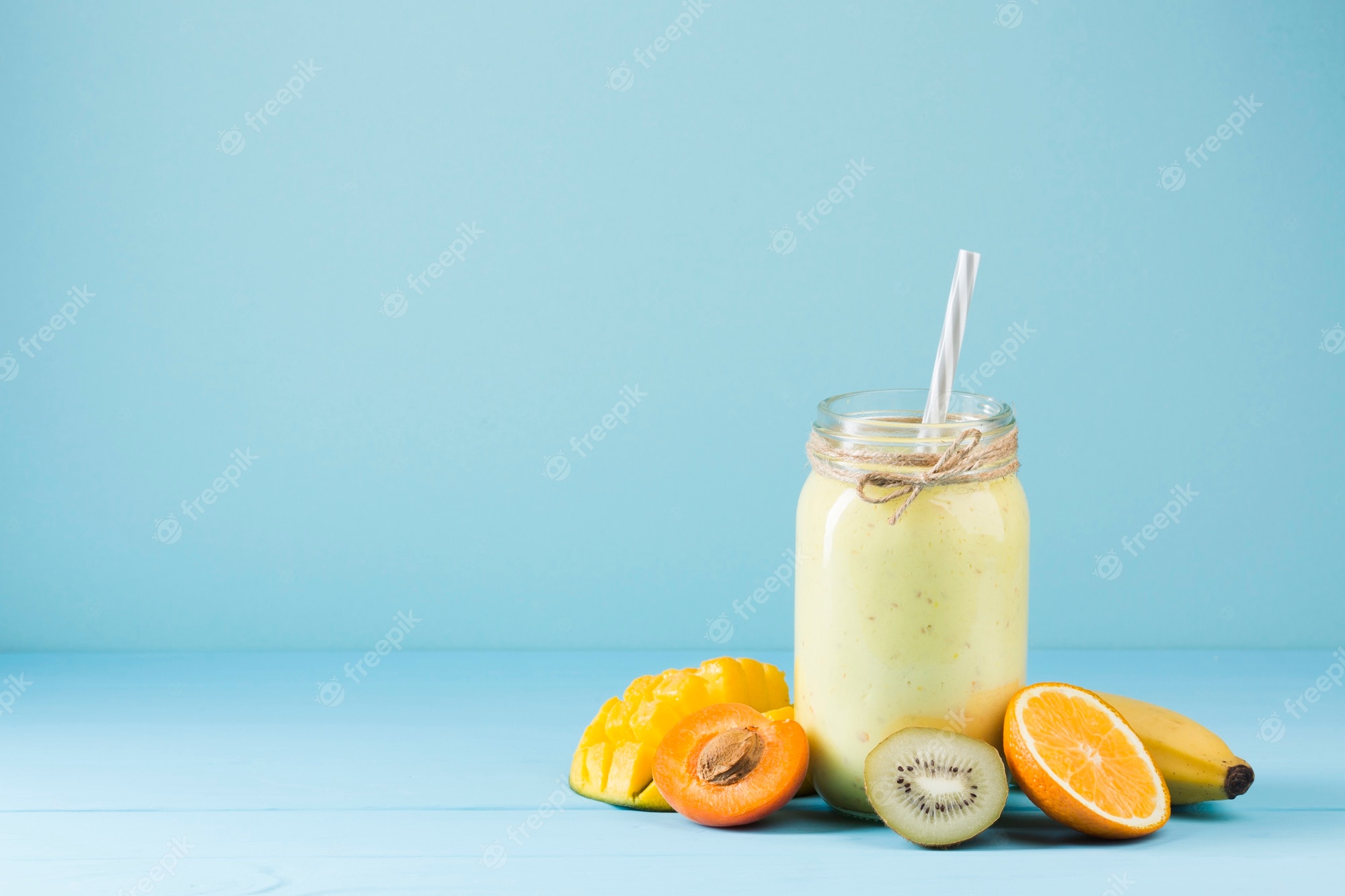 Premium photo colorful smoothie and fruit background