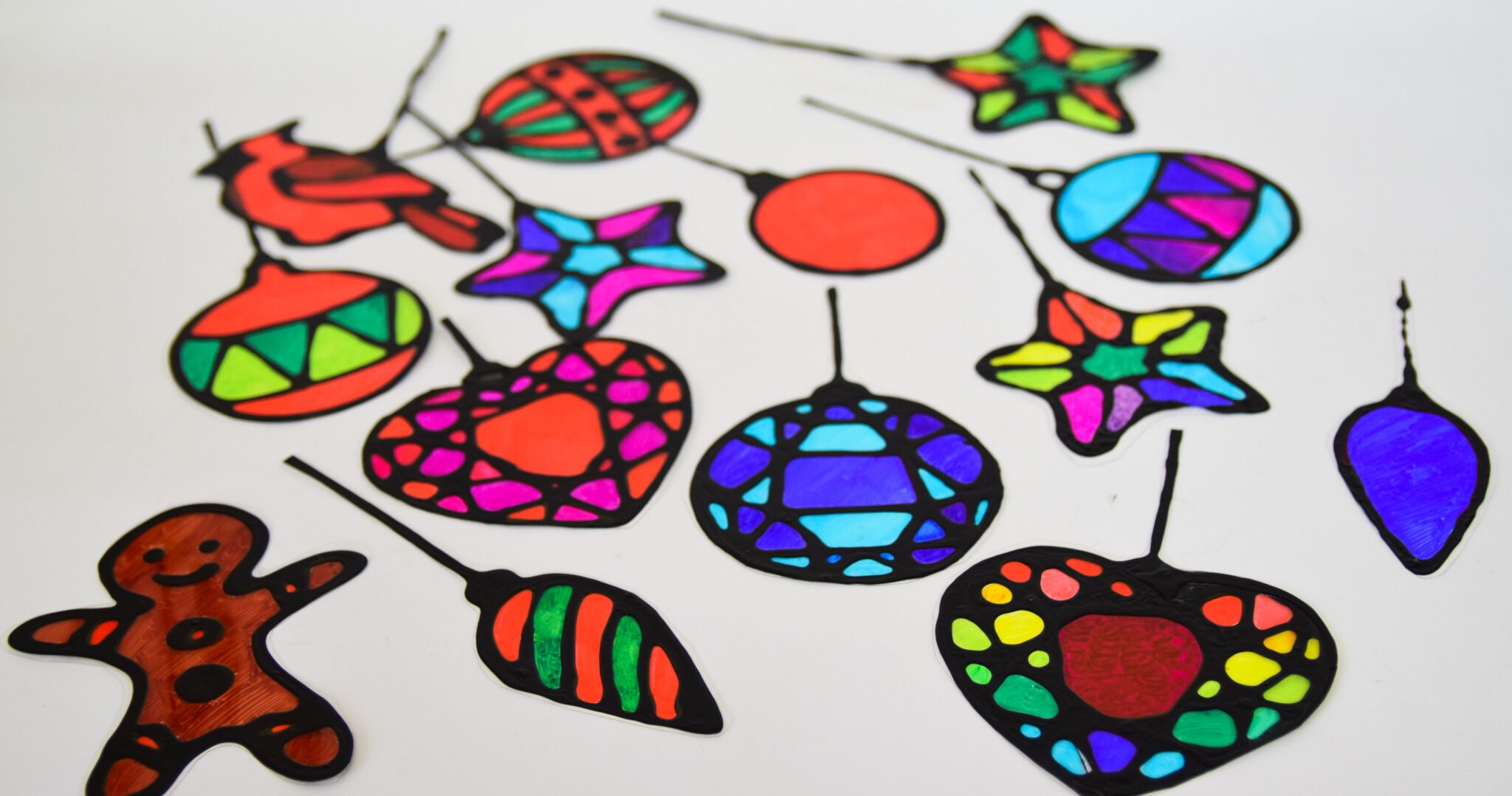 Stained glass christmas suncatchers with free printable templates