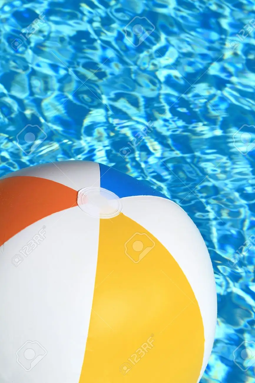 Summer background beach ball on the swimming pool stock photo picture and royalty free image image