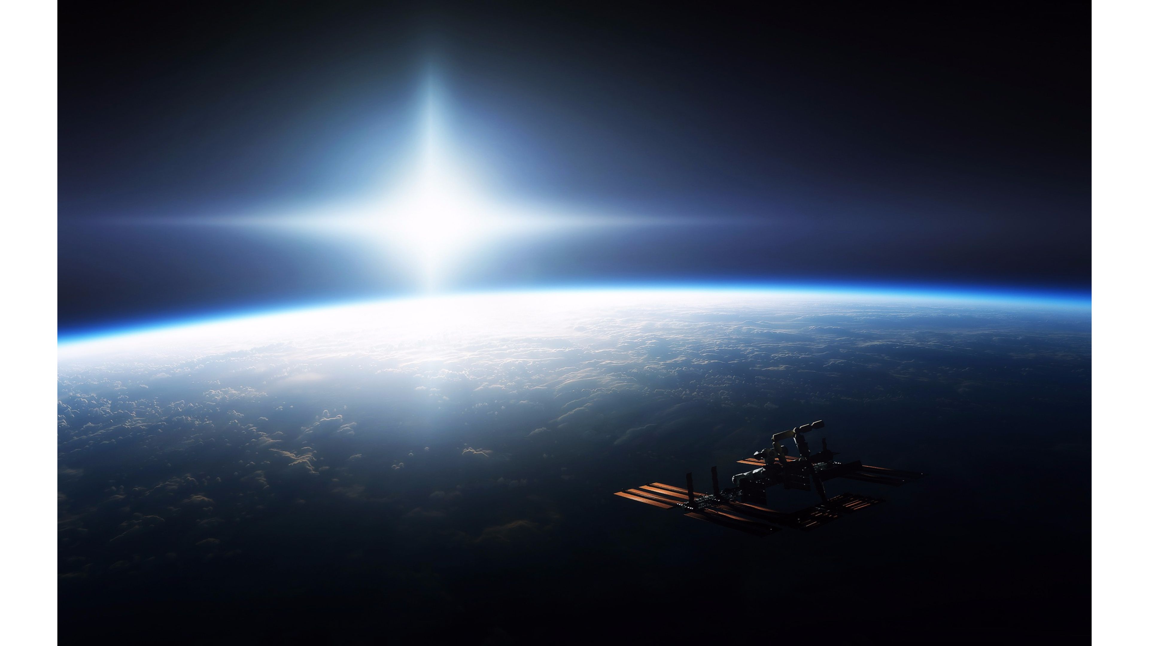 Sun over earth from space k wallpaper