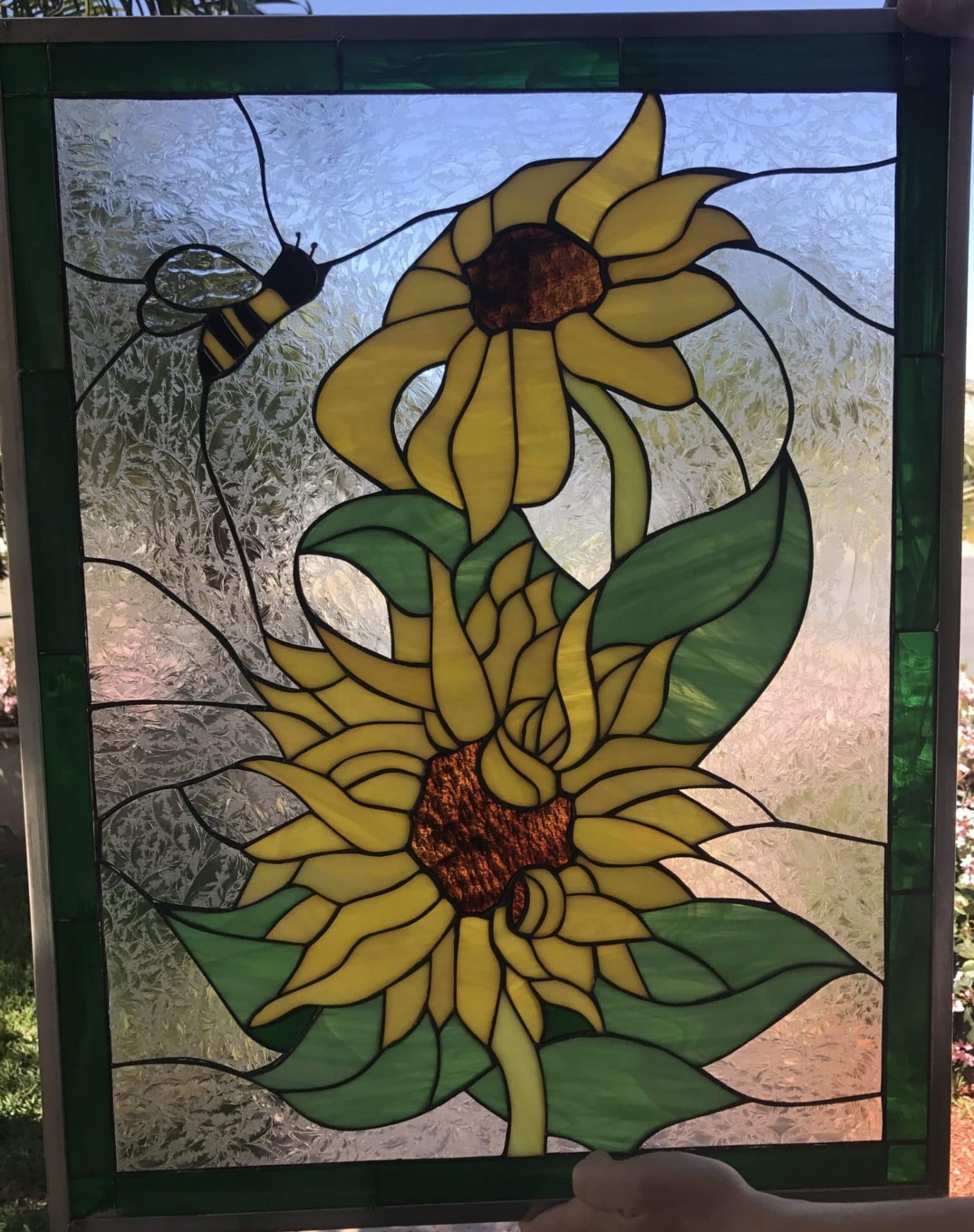 Cheerful sunflower leaded stained glass window panel
