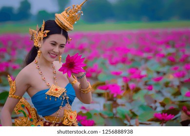 Beautiful young girl thai dress red stock photo