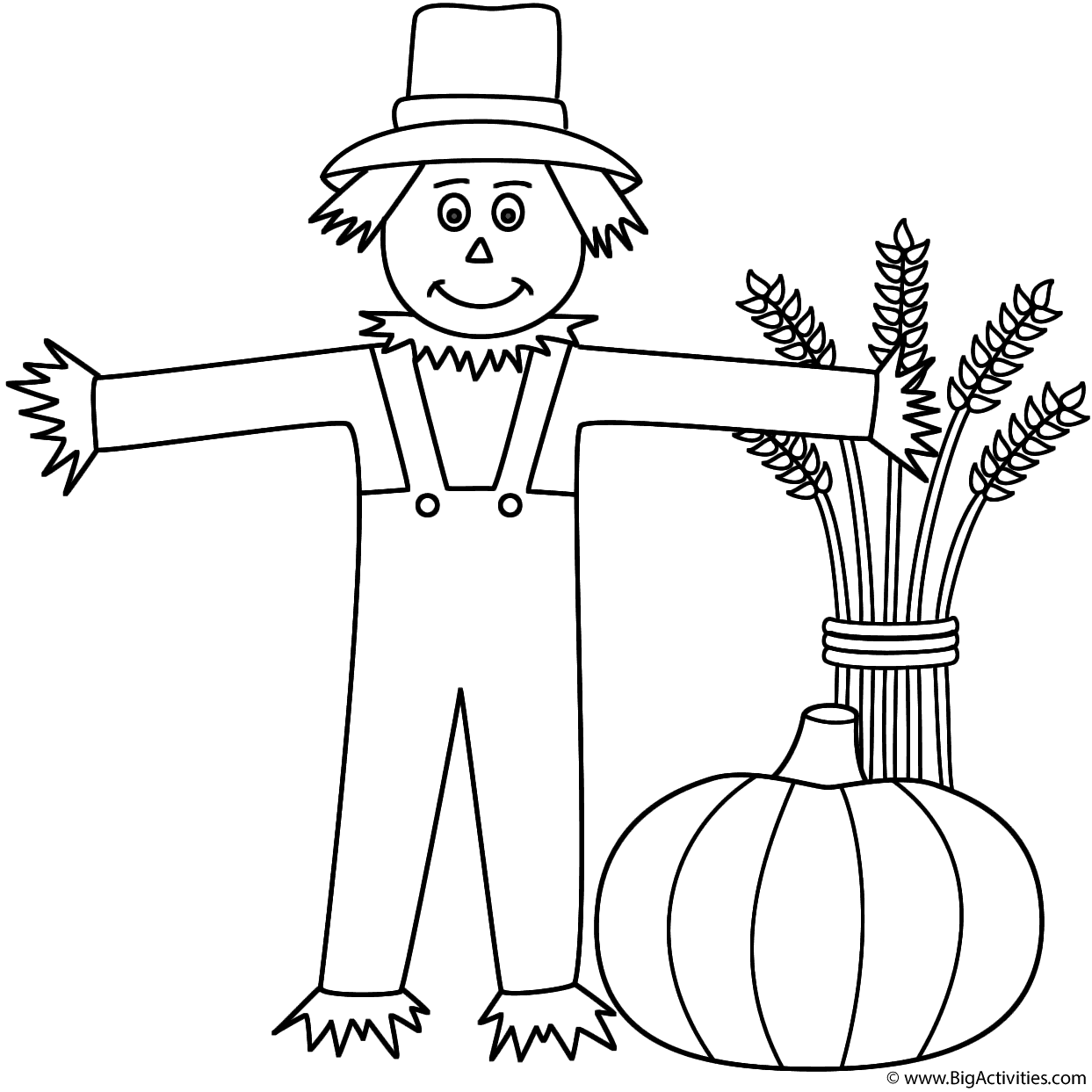 Scarecrow with wheat sheaf and pumpkin