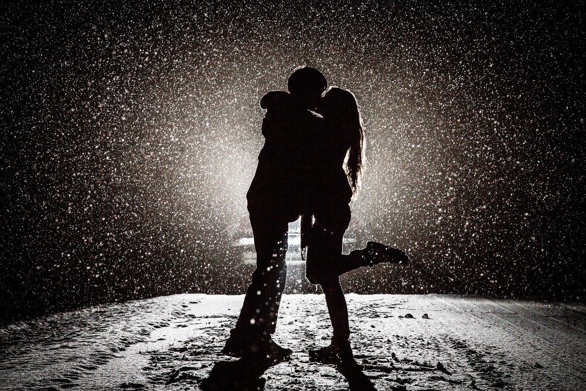 Couple kissing snow love