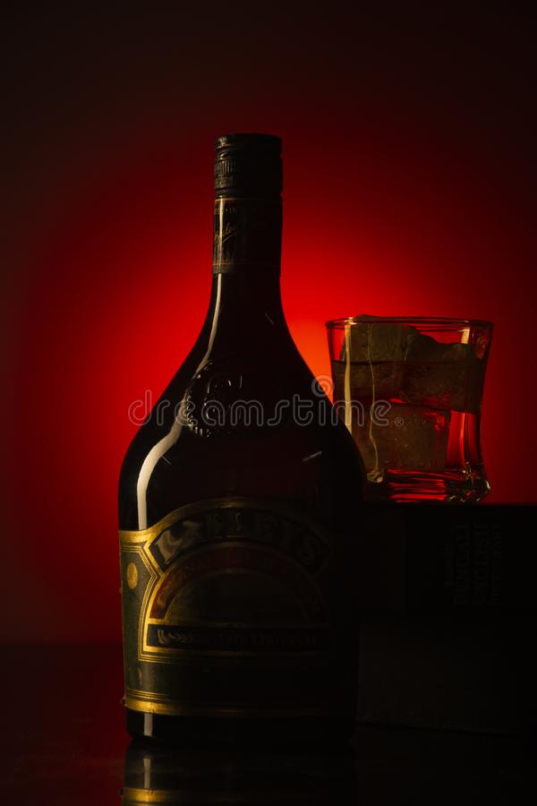 A glass and a bottle of whiskey wallpaper in hd stock image