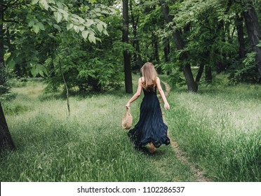 Young woman park running away into stock photo