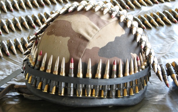Army Helmet And Ammunition Belts (click to view)